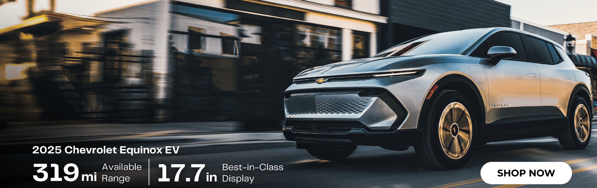 A silver 2025 Chevrolet Equinox EV drives on a blurred street. Text: 319 mi range, 17.7-in display.
